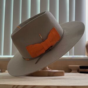 Elegant Tan Hat with Orange Bow